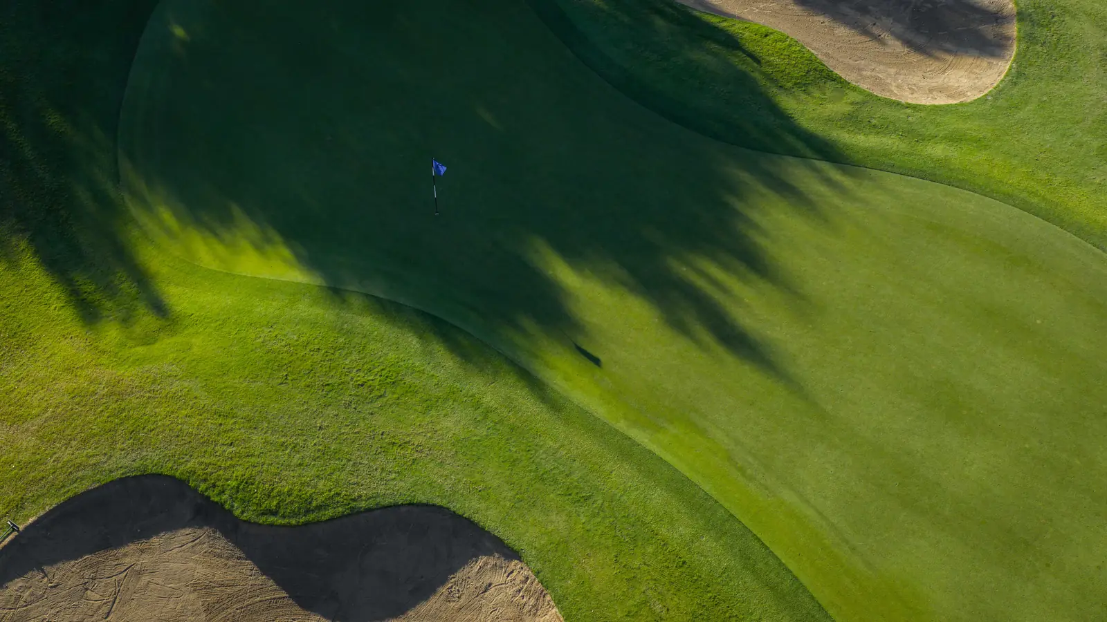 Golf course from above at golden hour
